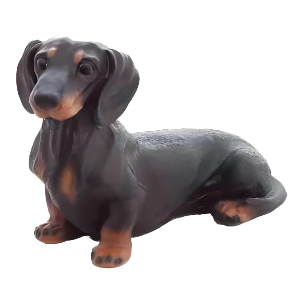 Figura dekoracyjna Pies jamnik leżący H: 22cm z żywicy