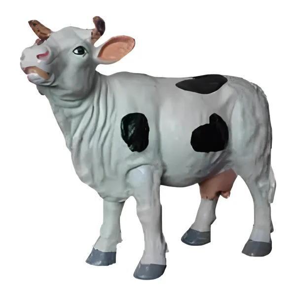Figura dekoracyjna Krowa H: 24cm z żywicy